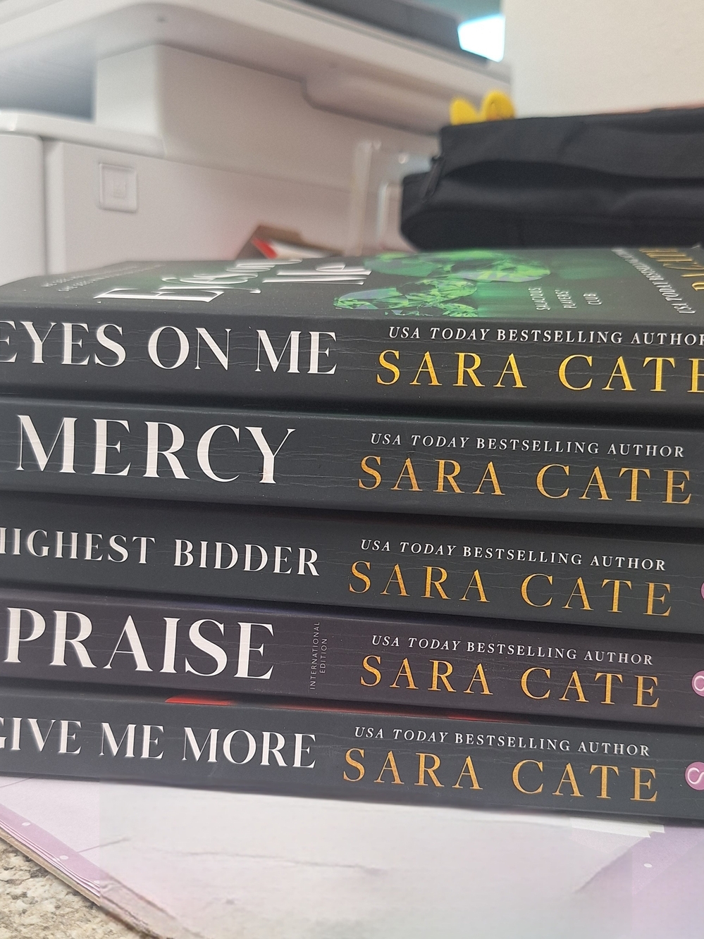 Black Paperback Romance Book Stack - 'Eyes On Me' & More